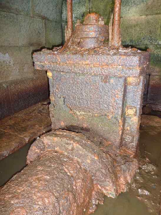 The valve in the tunnel beneath the northwest wall